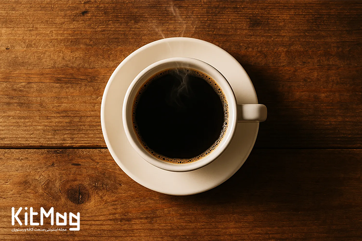 cup of black coffee on wooden table